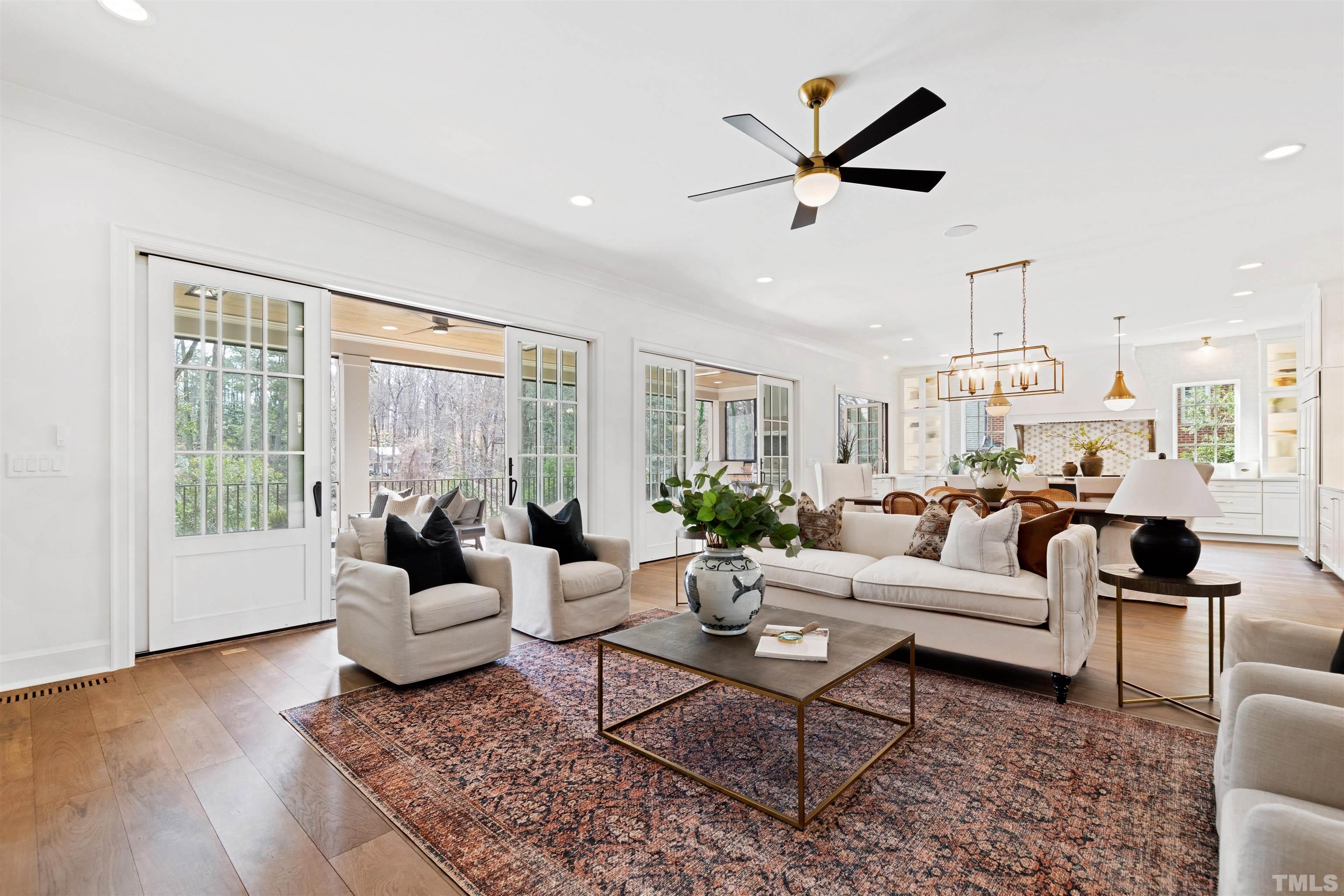 1716 Nottingham Road Raleigh, NC 27607 - Photo 13 of 78 a living room with furniture a table and a large window