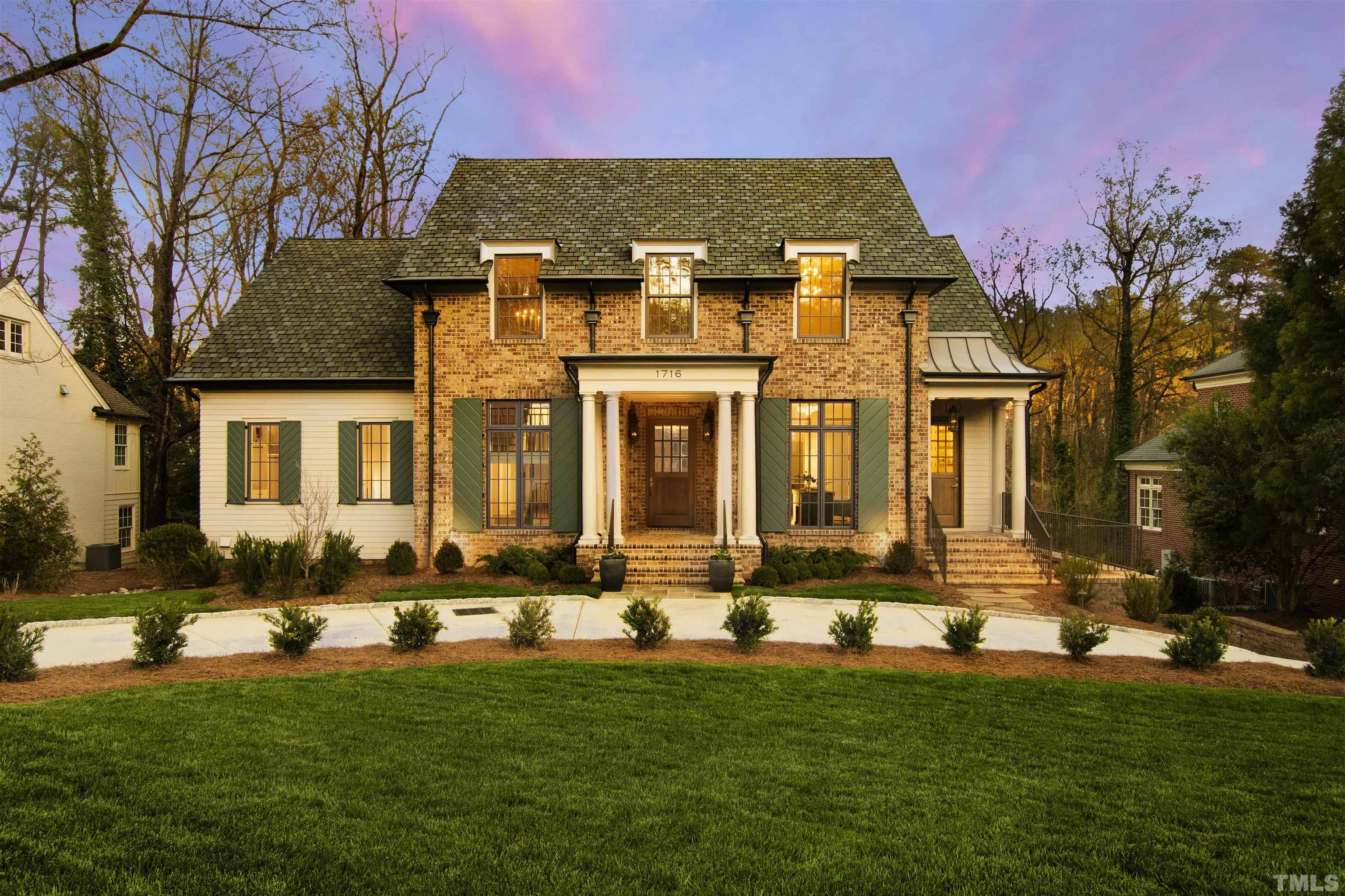 1716 Nottingham Road Raleigh, NC 27607 - Photo 2 of 78 front view of a house with a yard