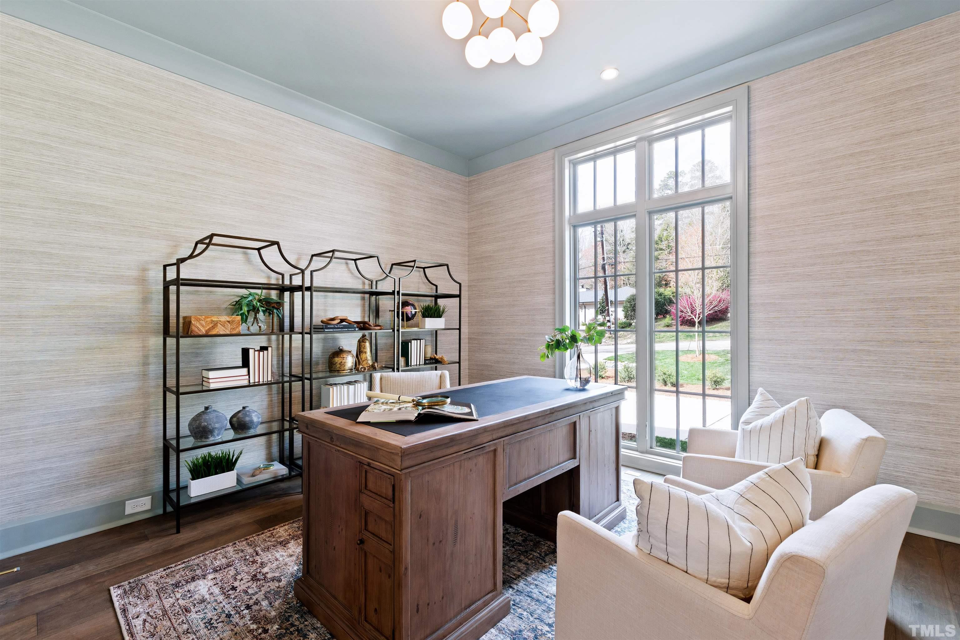 1716 Nottingham Road Raleigh, NC 27607 - Photo 26 of 78 a living room with furniture a window and a rug