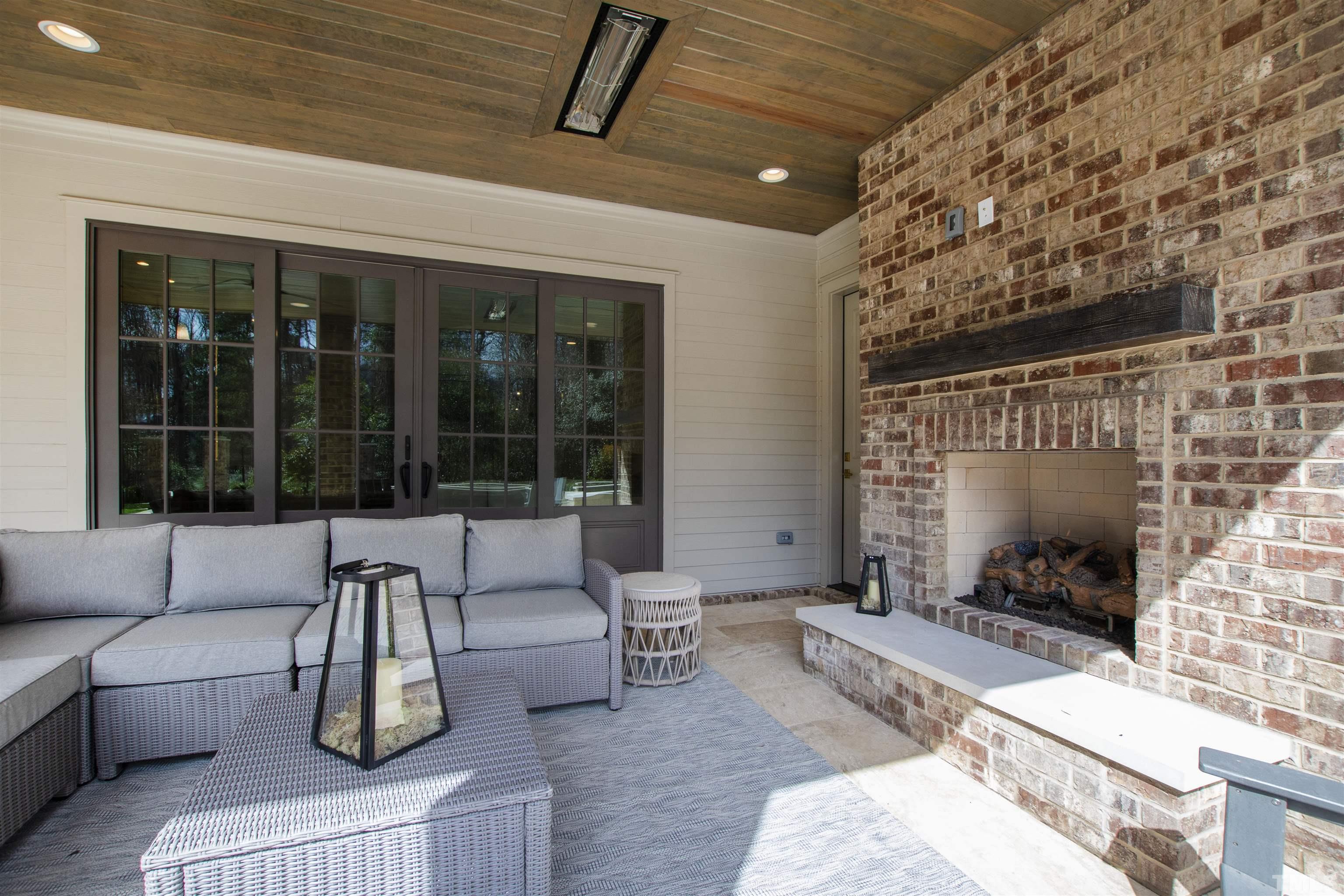 1716 Nottingham Road Raleigh, NC 27607 - Photo 30 of 78 a building outdoor space with patio furniture and potted plants
