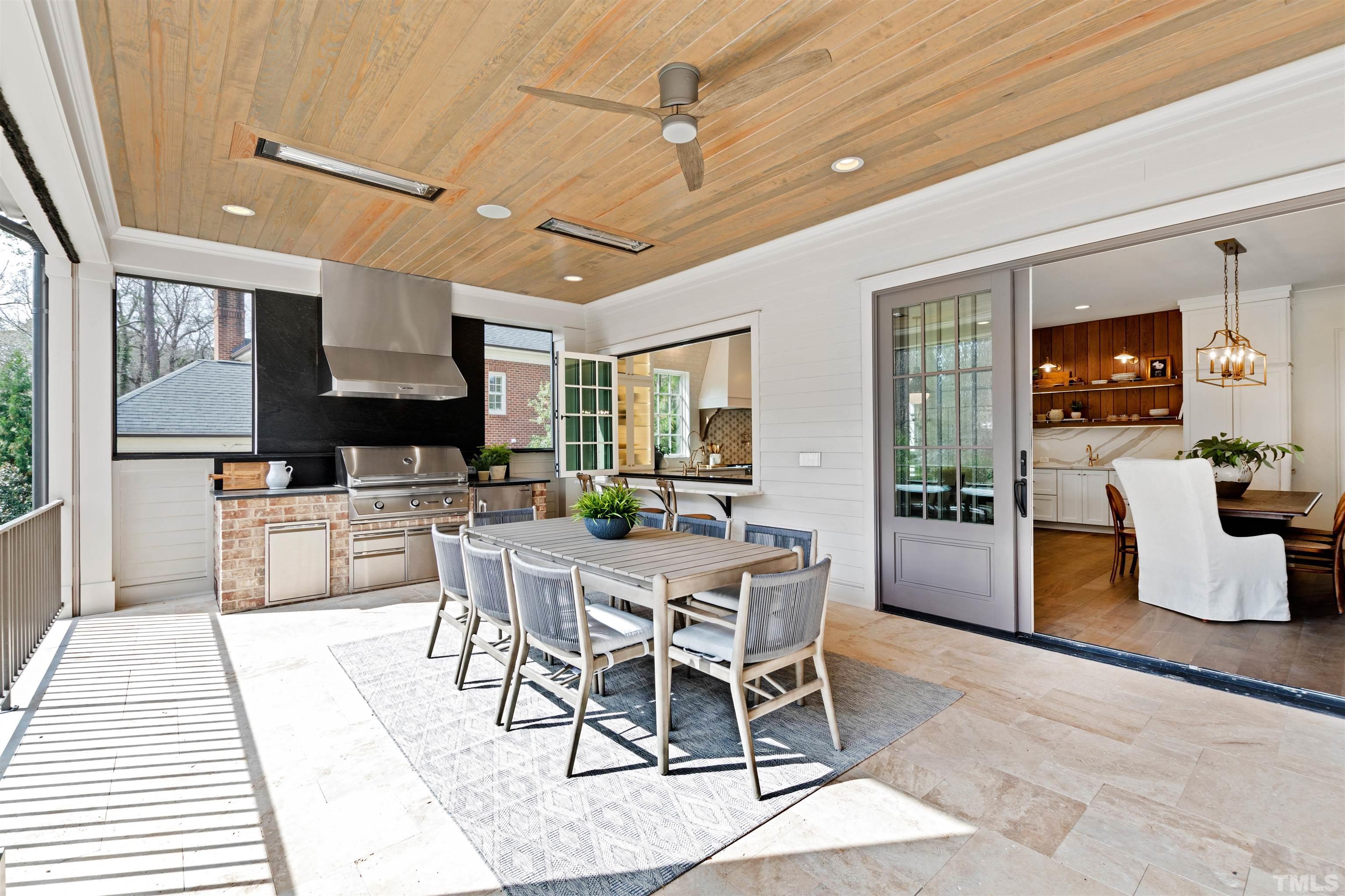 1716 Nottingham Road Raleigh, NC 27607 - Photo 32 of 78 a dining hall with stainless steel appliances kitchen island granite countertop a dining table chairs and view living room
