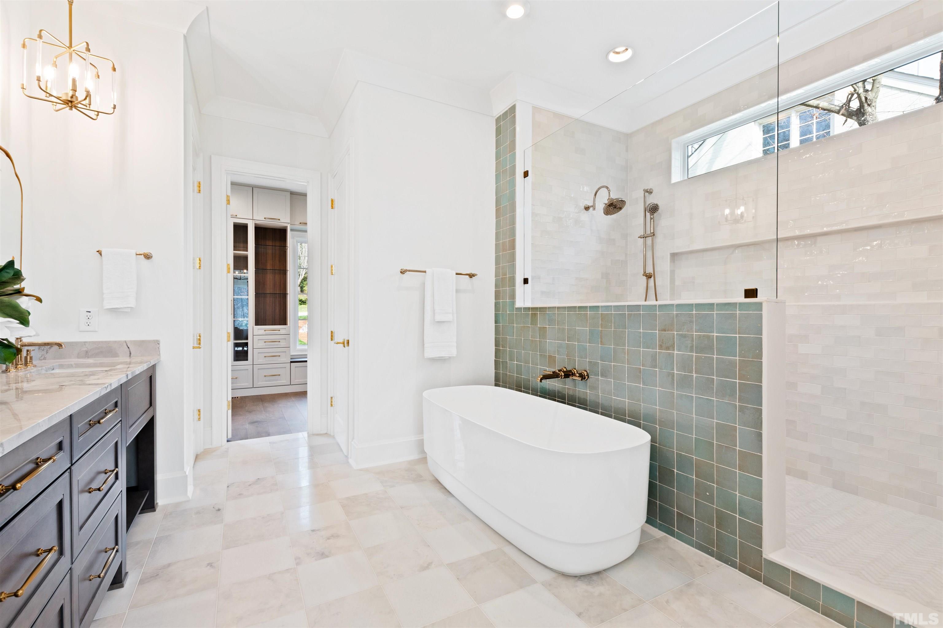 1716 Nottingham Road Raleigh, NC 27607 - Photo 36 of 78 a bathroom with a granite countertop bathtub sink vanity and mirror