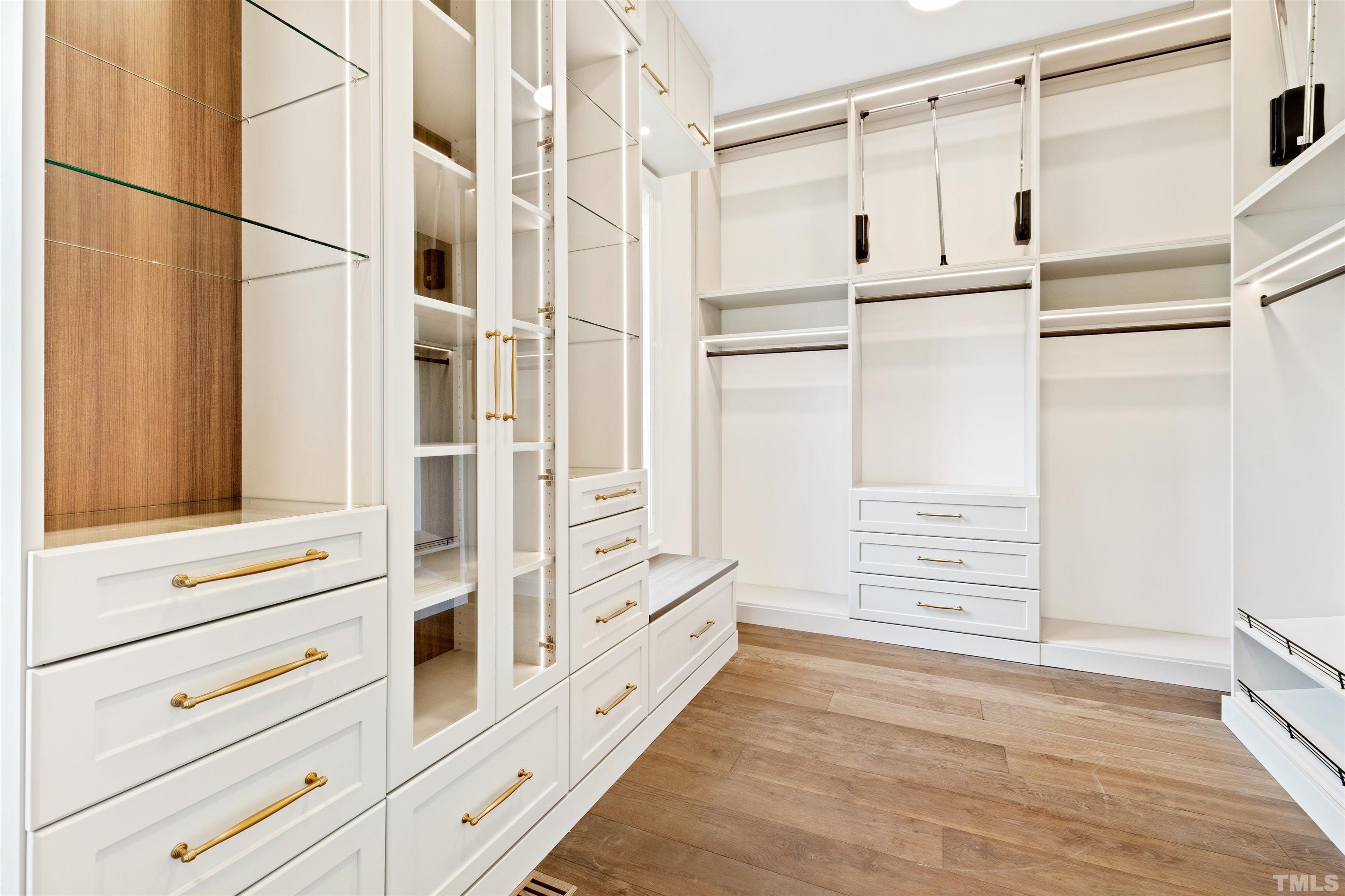 1716 Nottingham Road Raleigh, NC 27607 - Photo 40 of 78 a view of walk in closet with empty racks