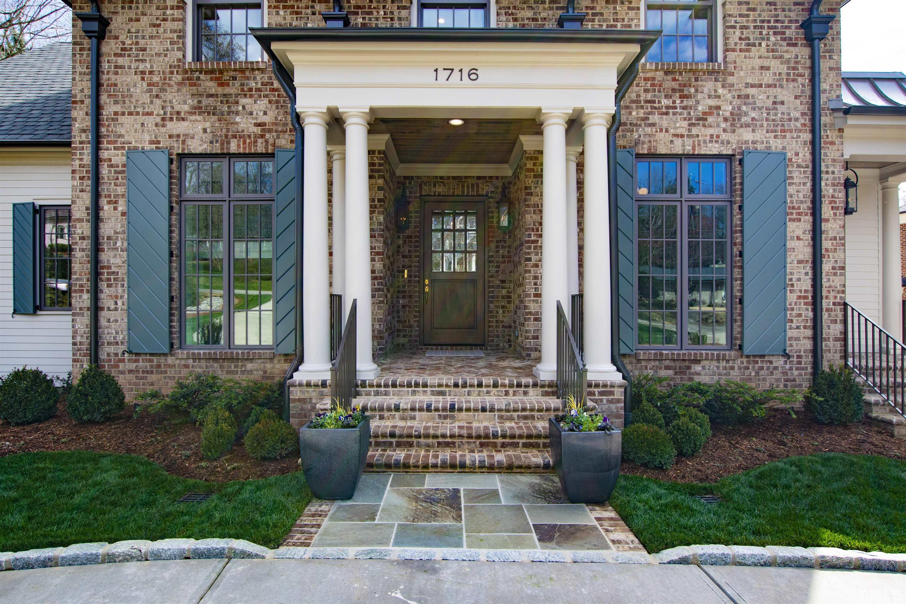 1716 Nottingham Road Raleigh, NC 27607 - Photo 4 of 78 a front view of a house with a garden