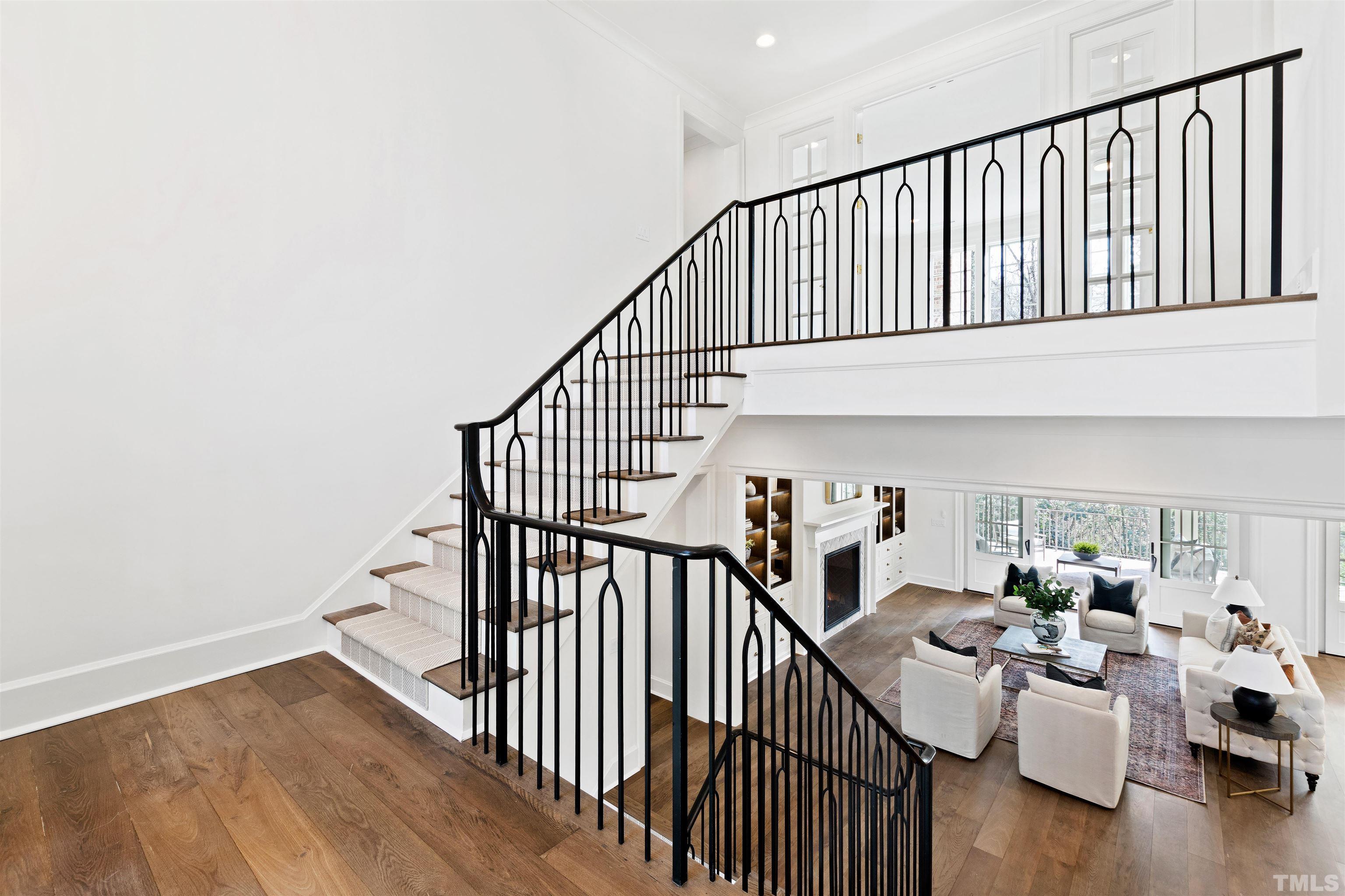1716 Nottingham Road Raleigh, NC 27607 - Photo 42 of 78 a view of entryway livingroom and hall with wooden floor