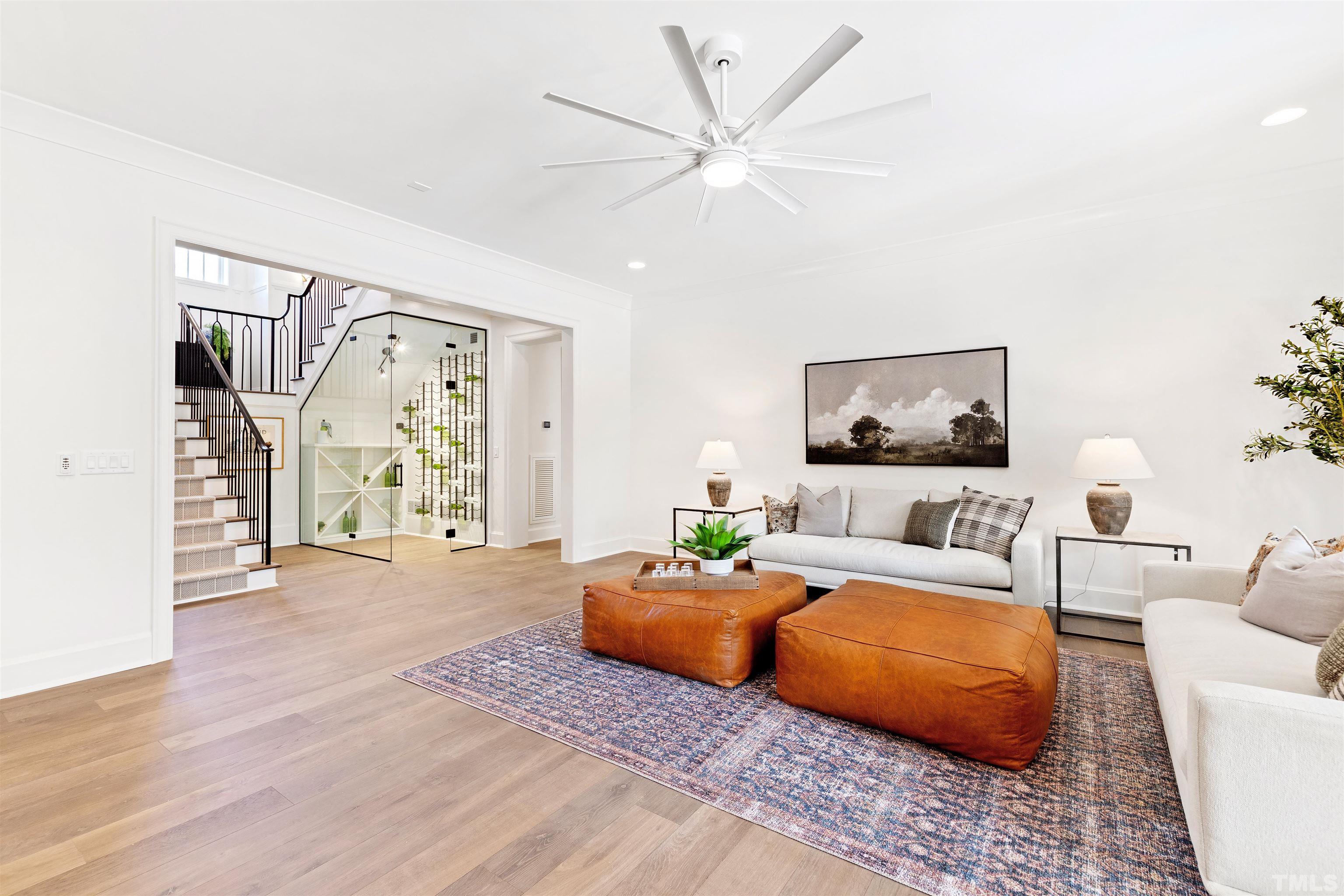 1716 Nottingham Road Raleigh, NC 27607 - Photo 61 of 78 a living room with furniture and a flat screen tv