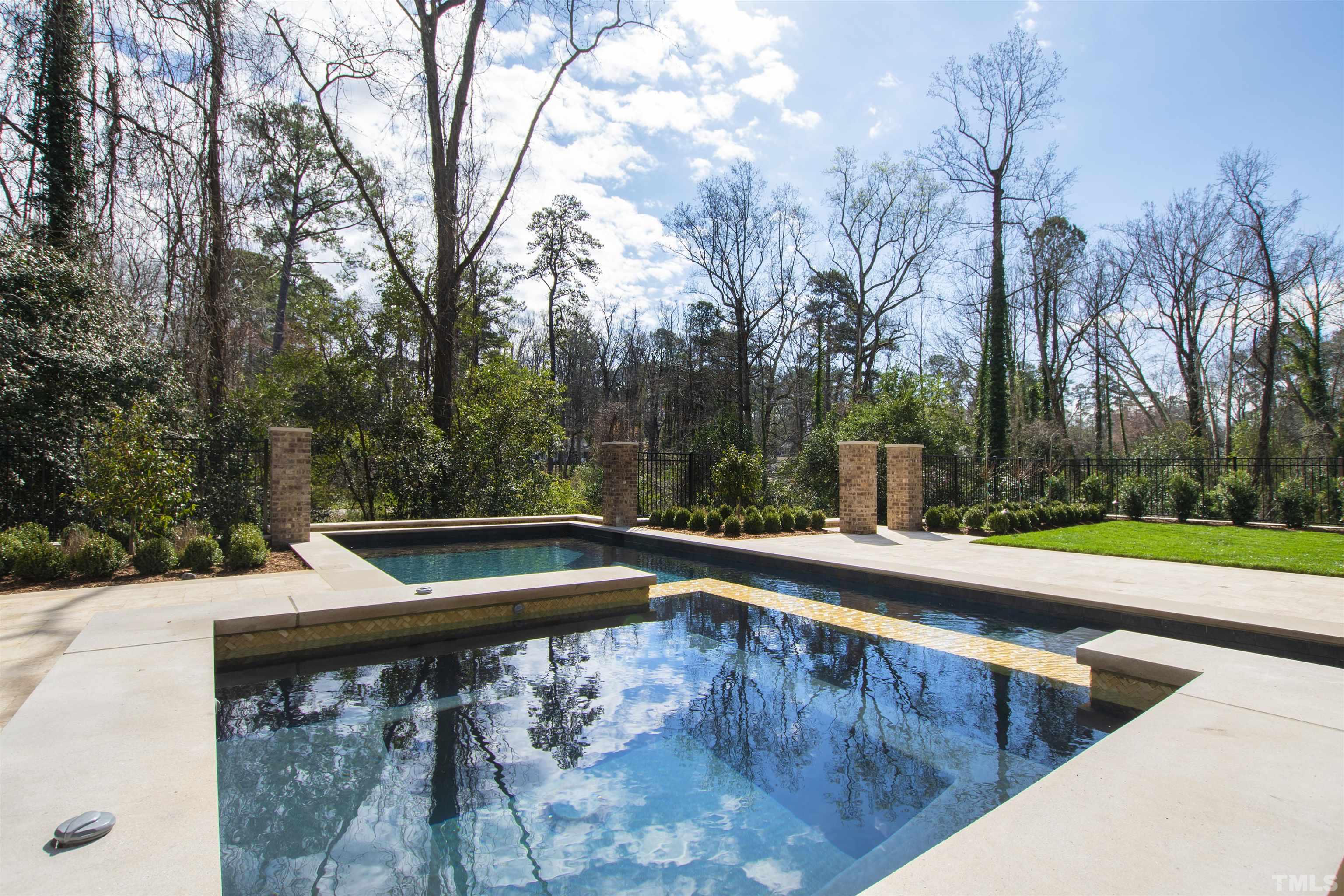 1716 Nottingham Road Raleigh, NC 27607 - Photo 75 of 78 a view of a swimming pool with a yard and large trees