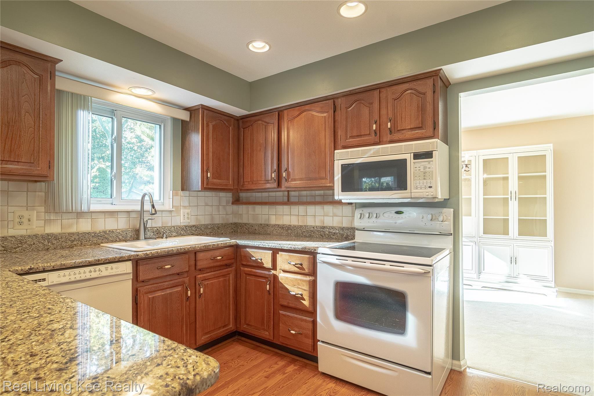 988 Briston Drive Rochester, MI 48307 - Photo 35 of 79 Kitchen with View to Formal Dining Room