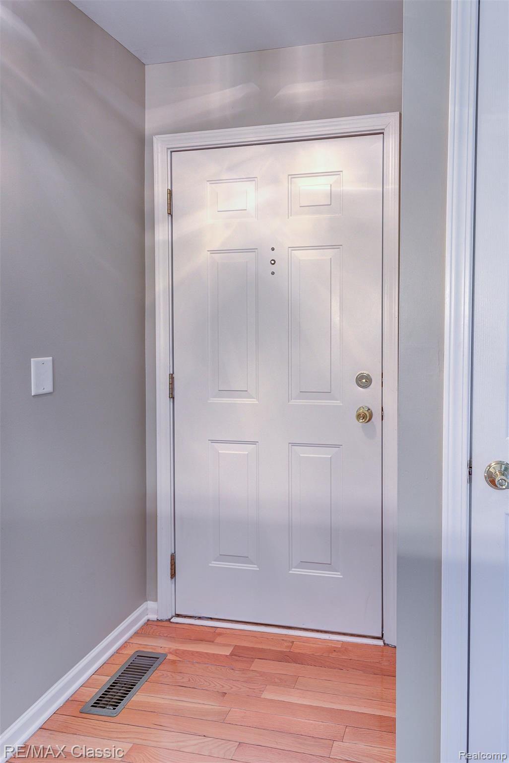 41620 Mitchell Road Novi, MI 48377 - Photo 36 of 40 Front entry with wood flooring