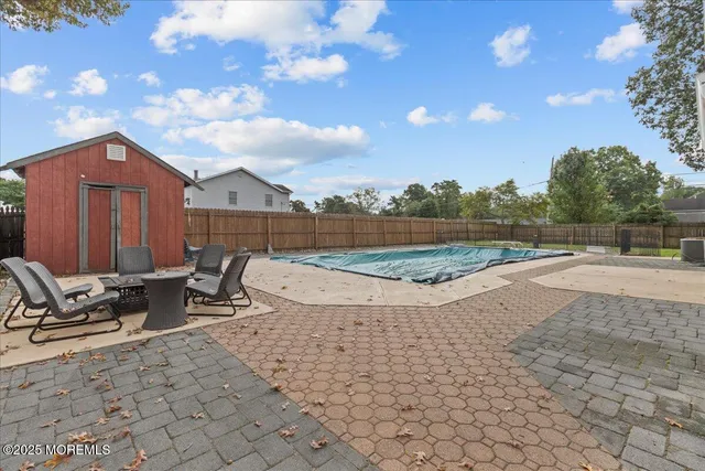a view of outdoor space with seating area