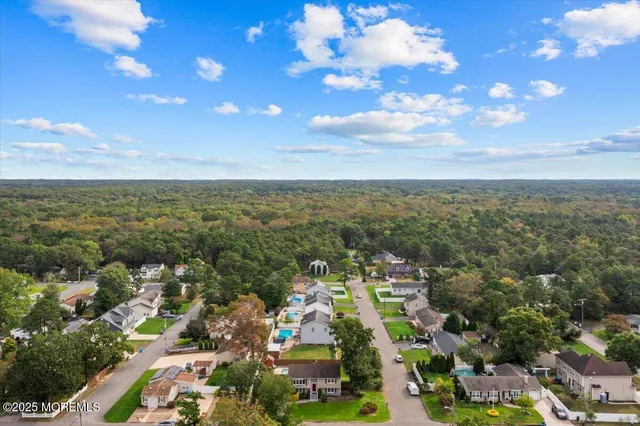 an aerial view of residential building with outdoor space