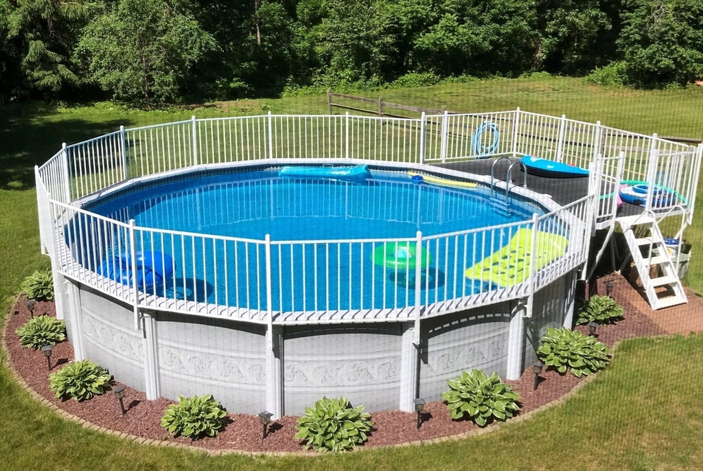 27 Dudley Road Sutton, MA 01590 - Photo 32 of 42 a view of a roof deck with a small deck