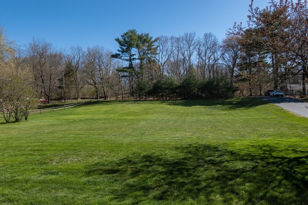 27 Dudley Road Sutton, MA 01590 - Photo 34 of 42 a view of a field of grass and trees