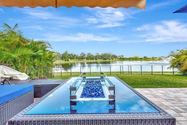 a view of a swimming pool and outdoor space