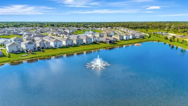 a view of a city with an ocean