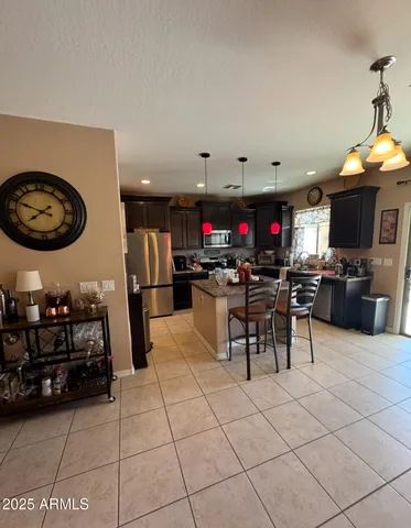 a kitchen with a stove and cabinets