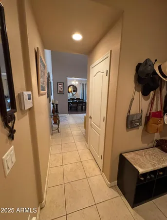 a bathroom with a sink a toilet a mirror and shower