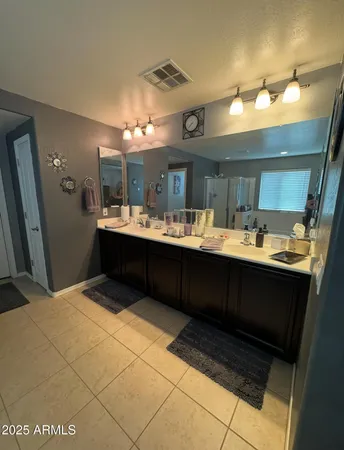 a view of a livingroom with furniture and a flat screen tv
