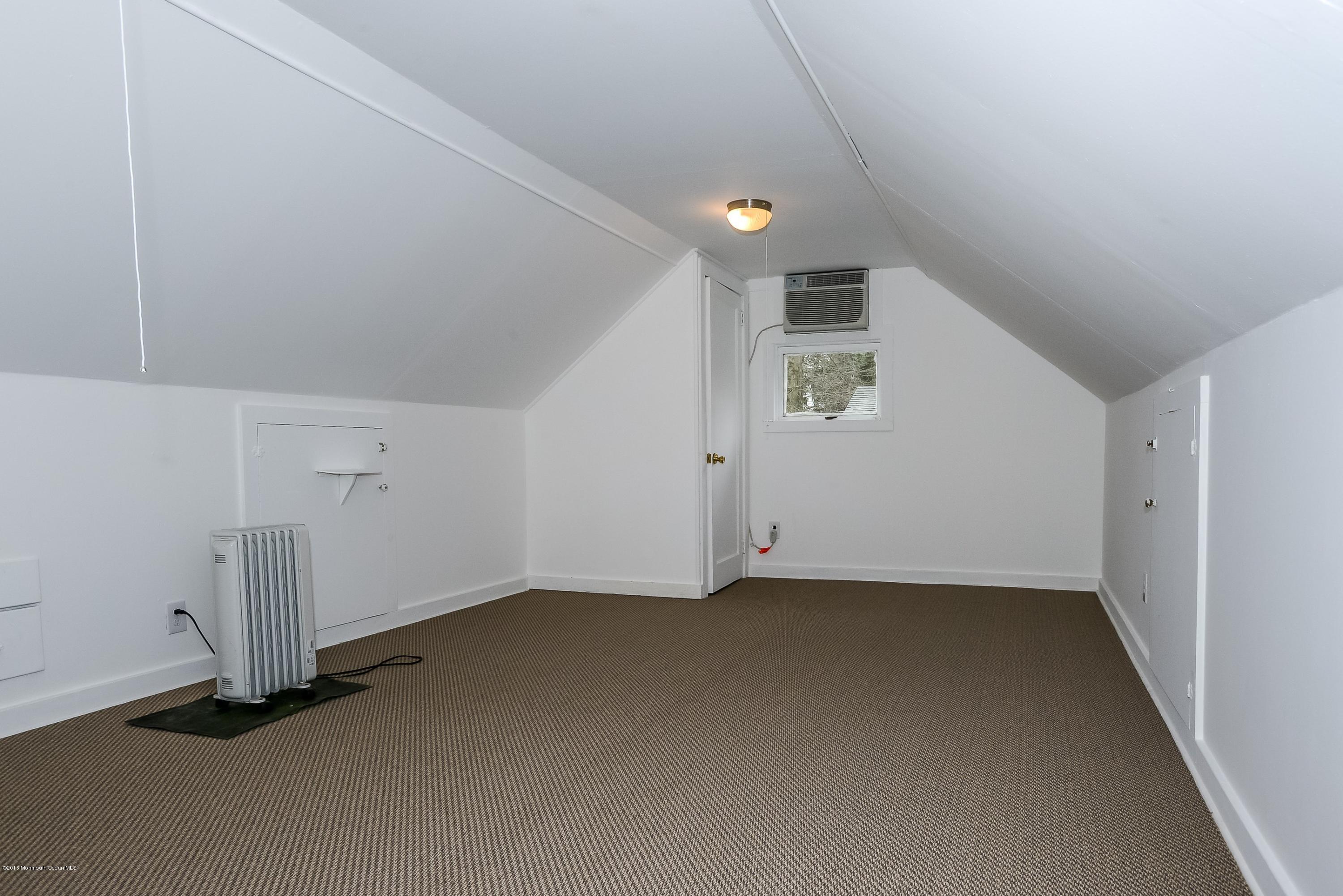 229 Pinecrest Road Oakhurst, NJ 07755 - Photo 12 of 12 an empty room with a empty space