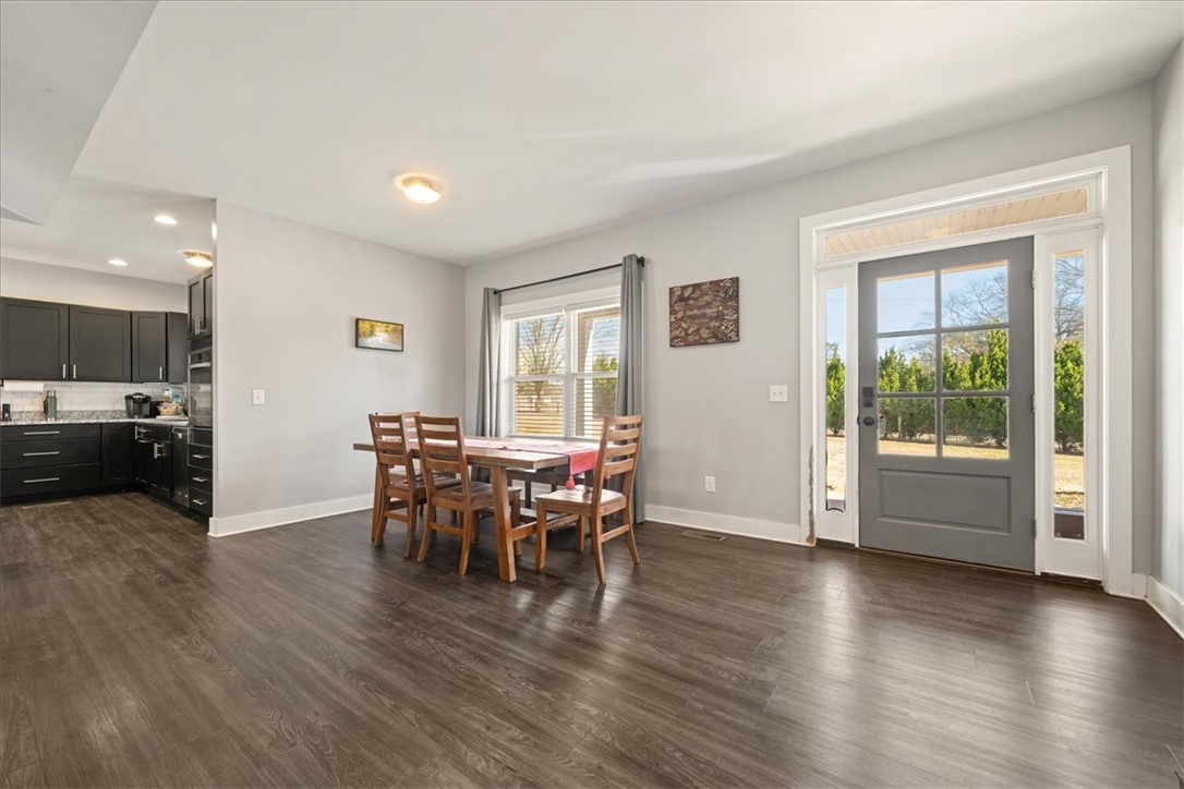 212 Winding Lane Seneca, SC 29672 - Photo 11 of 47 This inviting space features an open concept layout, ideal for both entertaining and everyday living.