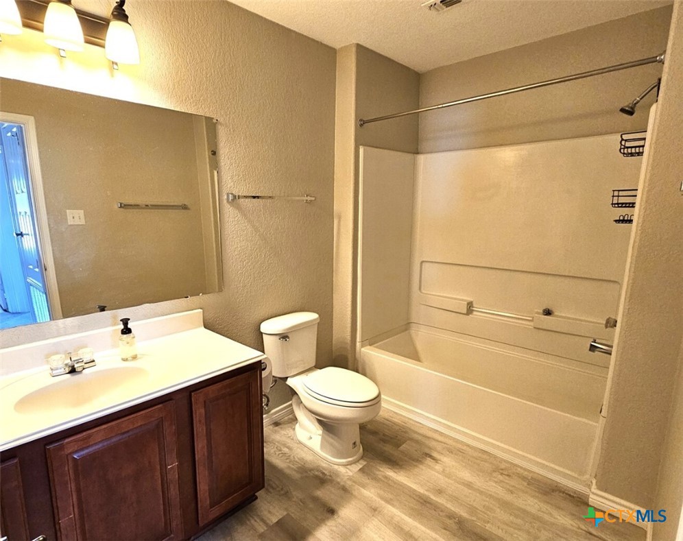 316 Julian Point Cibolo, TX 78108 - Photo 15 of 28 a bathroom with a sink a toilet and shower