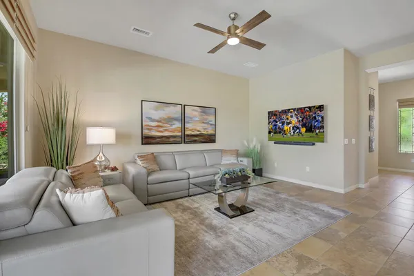 a living room with furniture and a couch