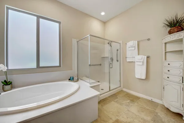 a bathroom with a sink and a shower