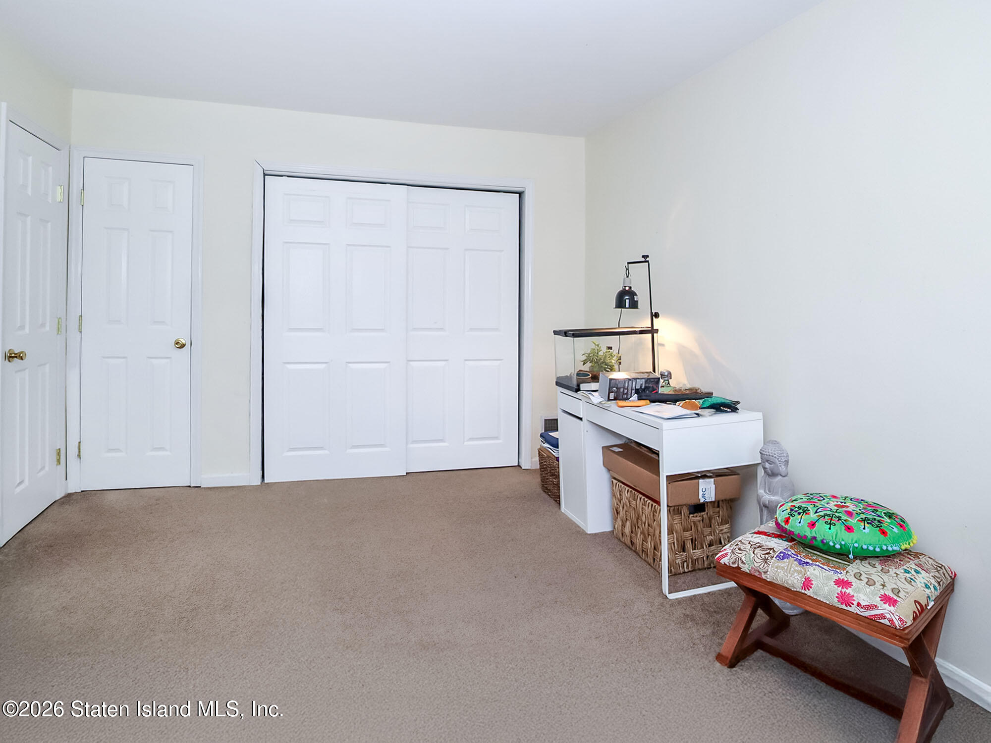 537 Willow Road East, Unit 1 Staten Island, NY 10314 - Photo 13 of 23 a room with furniture and toys