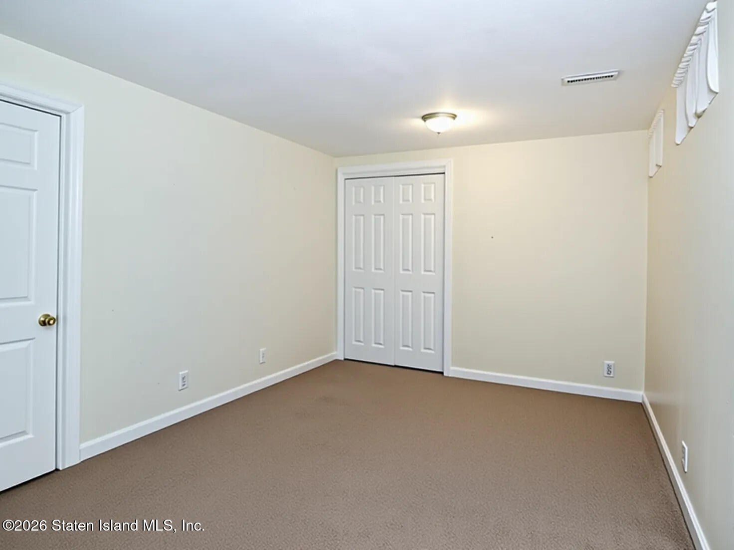 537 Willow Road East, Unit 1 Staten Island, NY 10314 - Photo 17 of 23 a view of an empty room