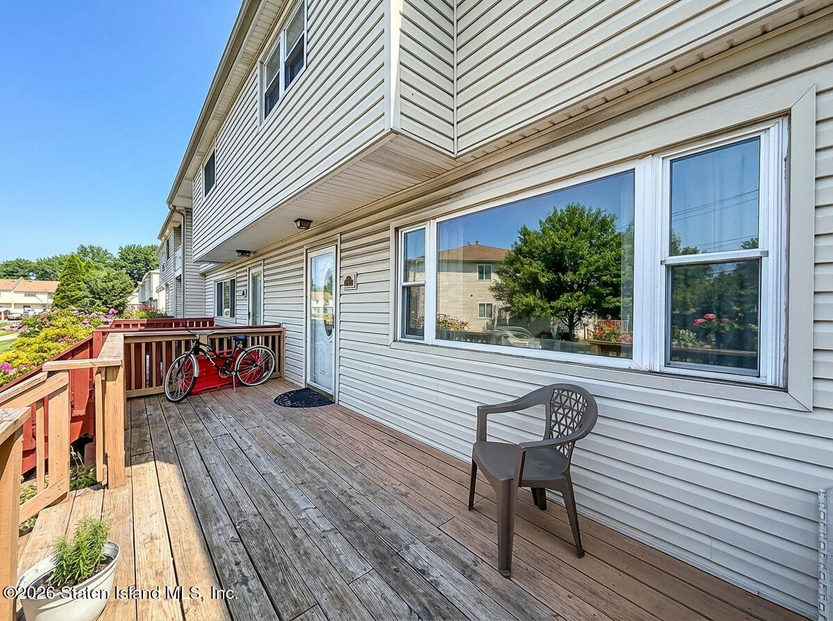 537 Willow Road East, Unit 1 Staten Island, NY 10314 - Photo 3 of 23 a view of a chairs on the roof deck