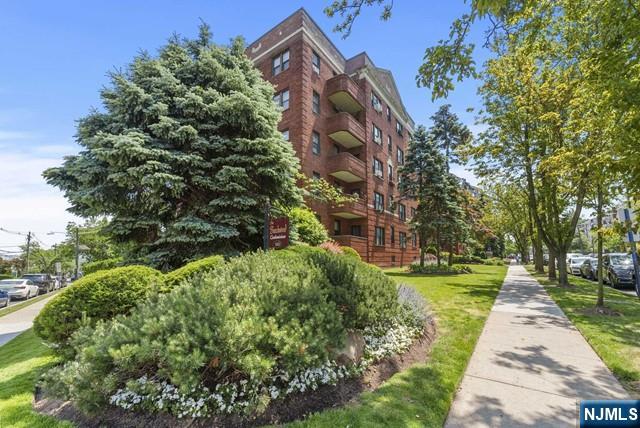 100 Prospect Avenue, Unit 5K Hackensack, NJ 07601 - Photo 11 of 11 a view of a street with a building in the background