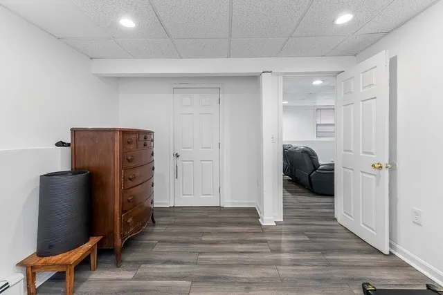 a view of a livingroom with furniture and wooden floor