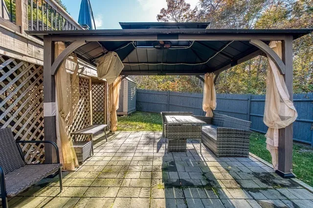 a view of entryway door with wooden floor