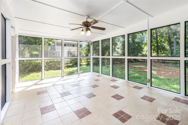 a view of a room with a large window