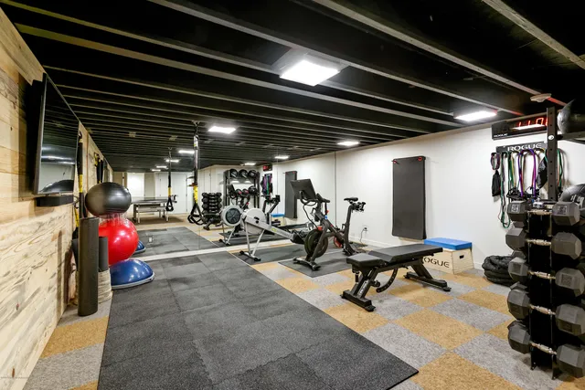 a view of a storage room with gym equipment