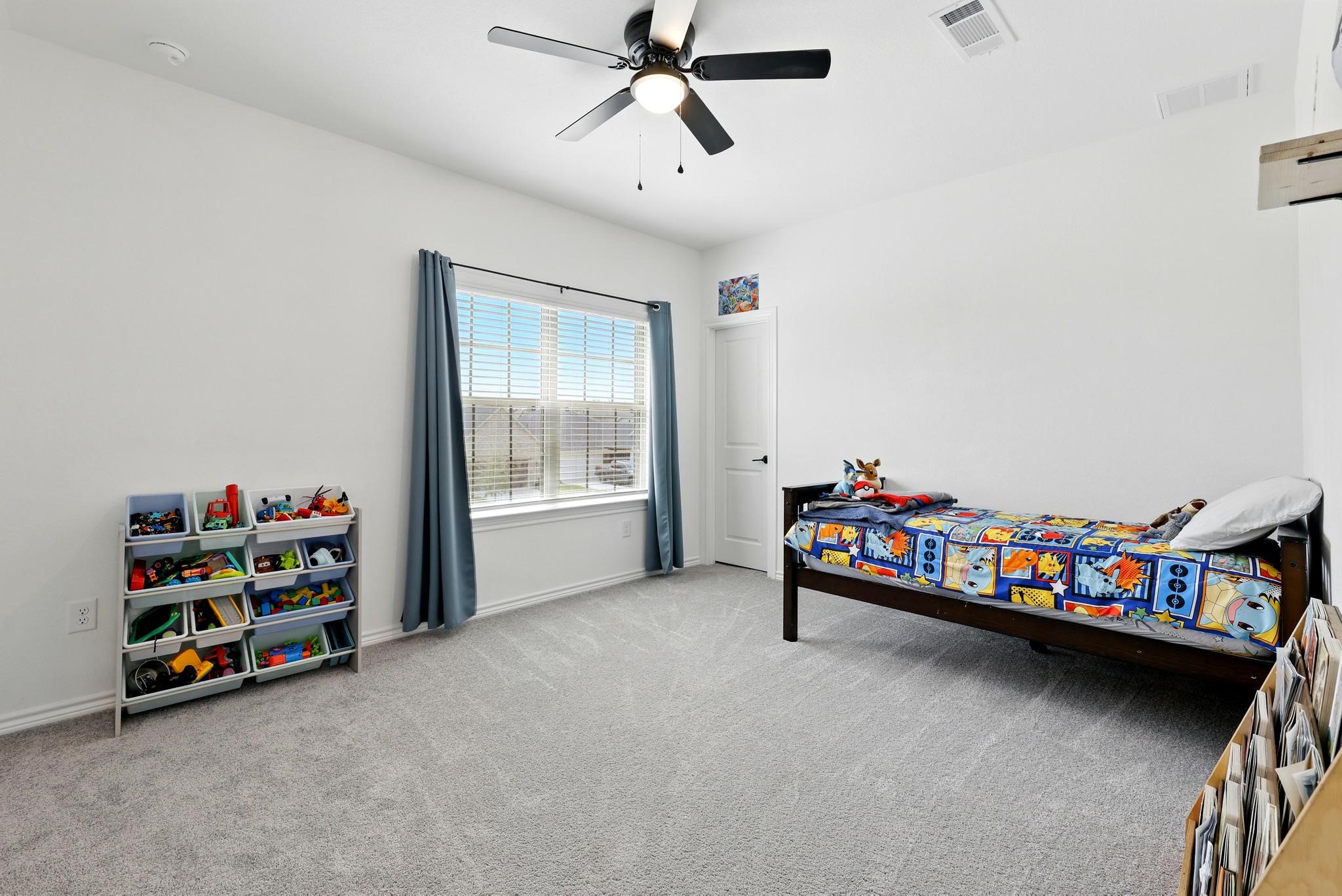 15727 Rosemary Hl Lane Conroe, TX 77302 - Photo 23 of 28 a kid room with toys
