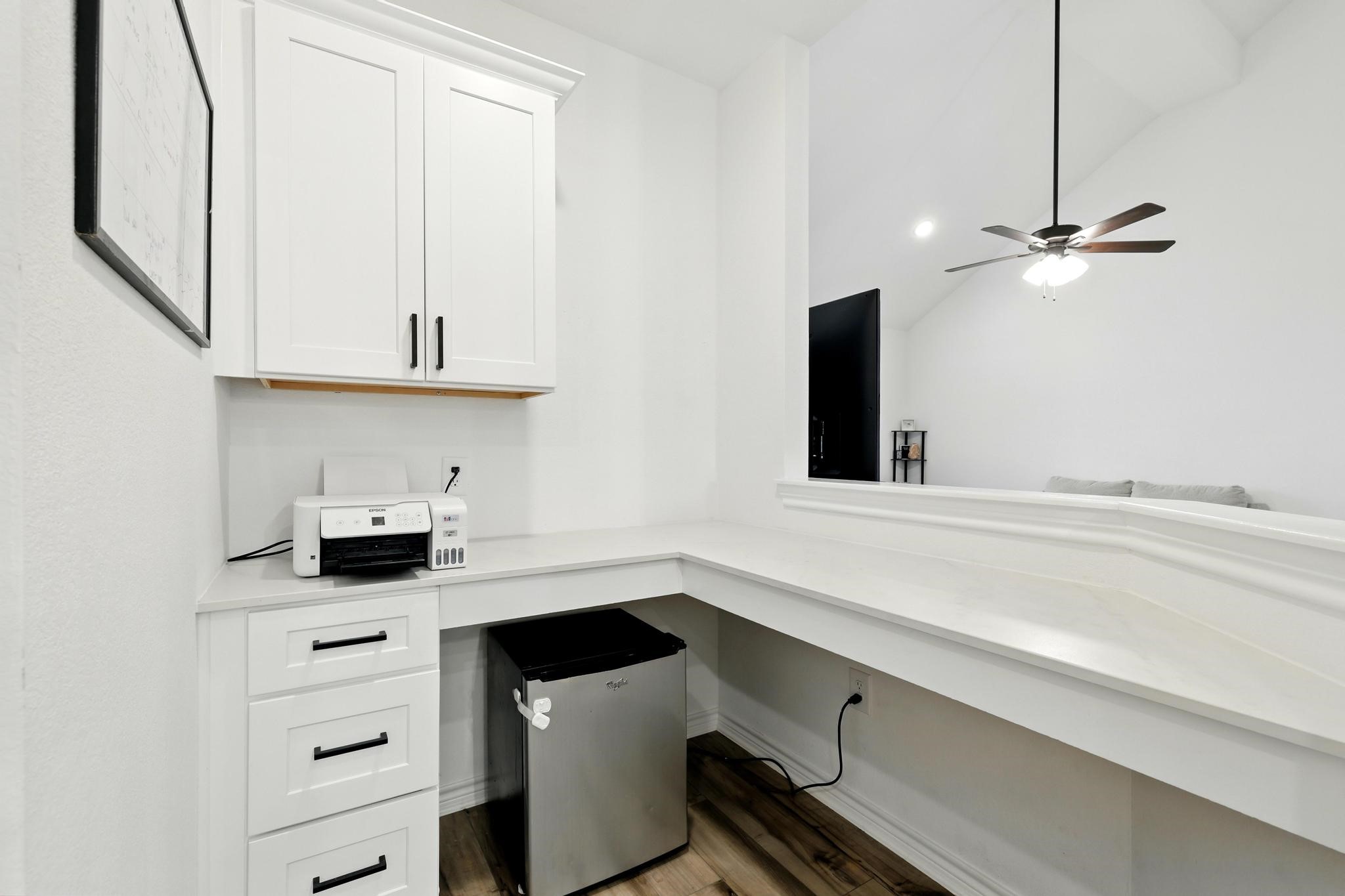 15727 Rosemary Hl Lane Conroe, TX 77302 - Photo 7 of 28 a kitchen with a sink and cabinets
