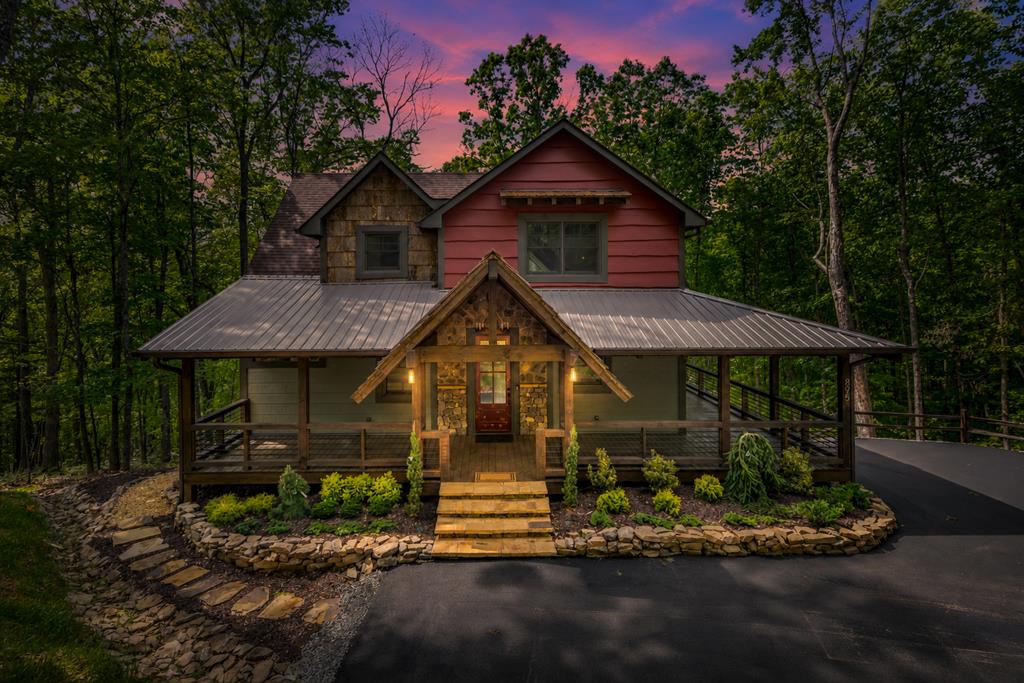 895 Price Road Blue Ridge, GA 30513 - Photo 40 of 140 a front view of a house with a yard