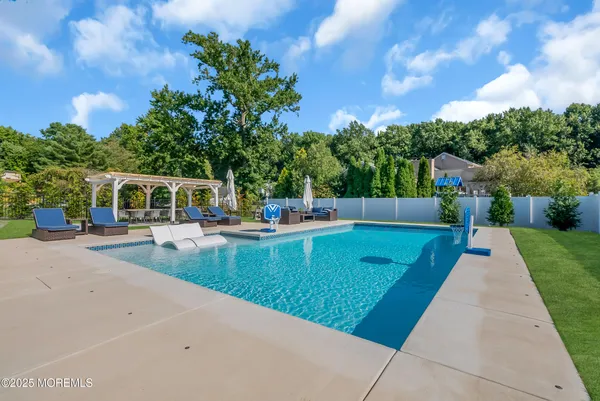 a view of a house with a swimming pool