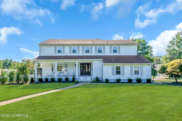 a view of a house with a garden