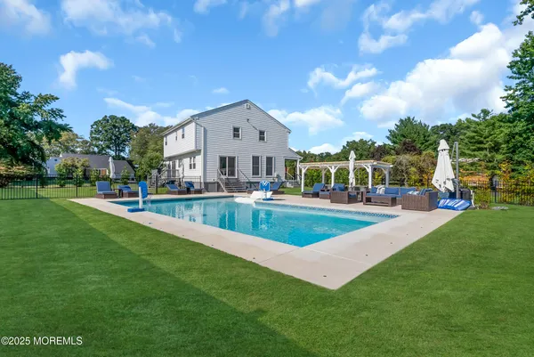 a view of a house with a big yard