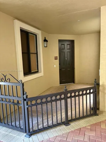 a kitchen with stainless steel appliances a refrigerator and a stove top oven