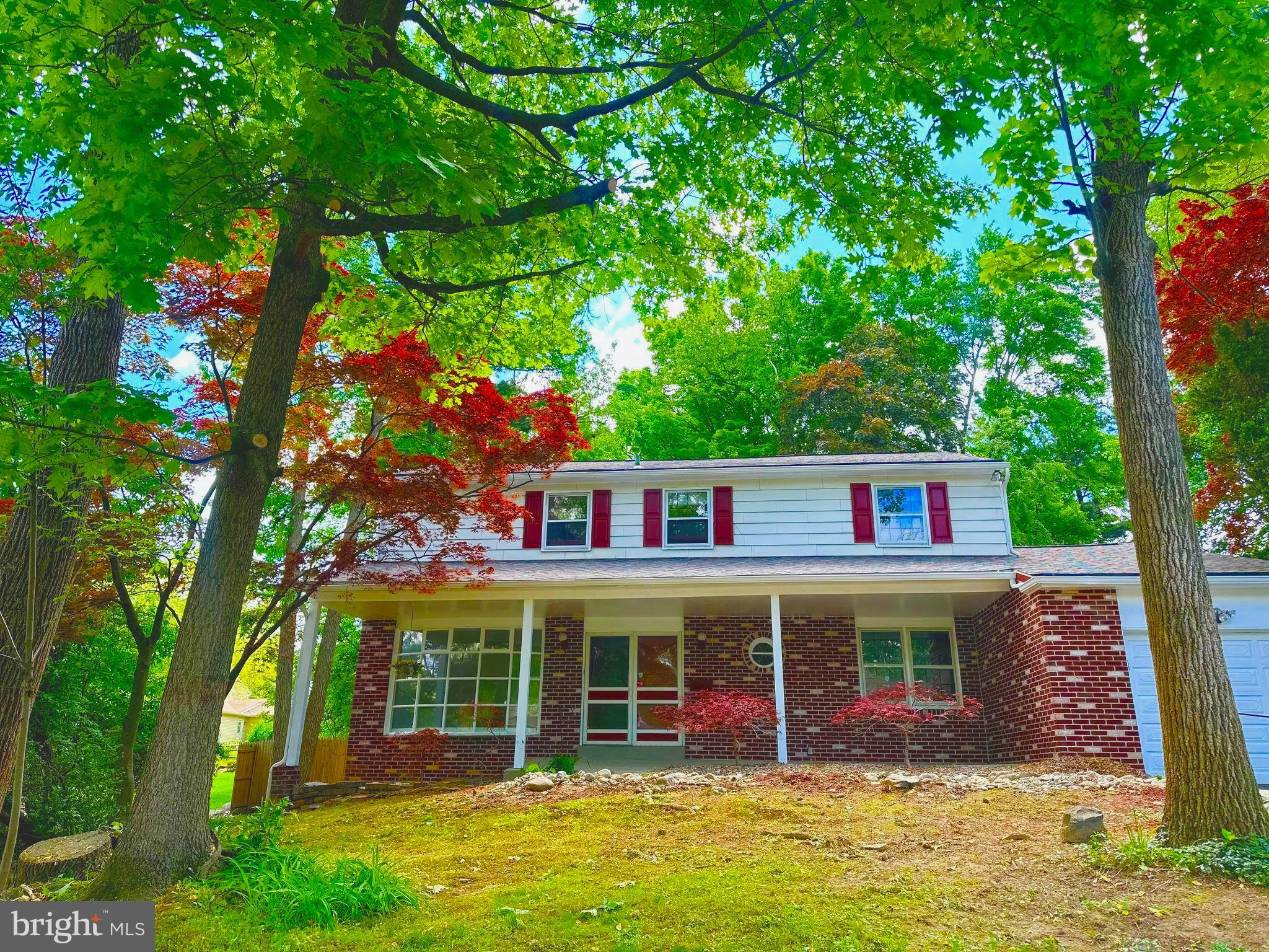 1227 Dundee Drive Dresher, PA 19025 - Photo 1 of 39 Recently Refreshed Front Yard