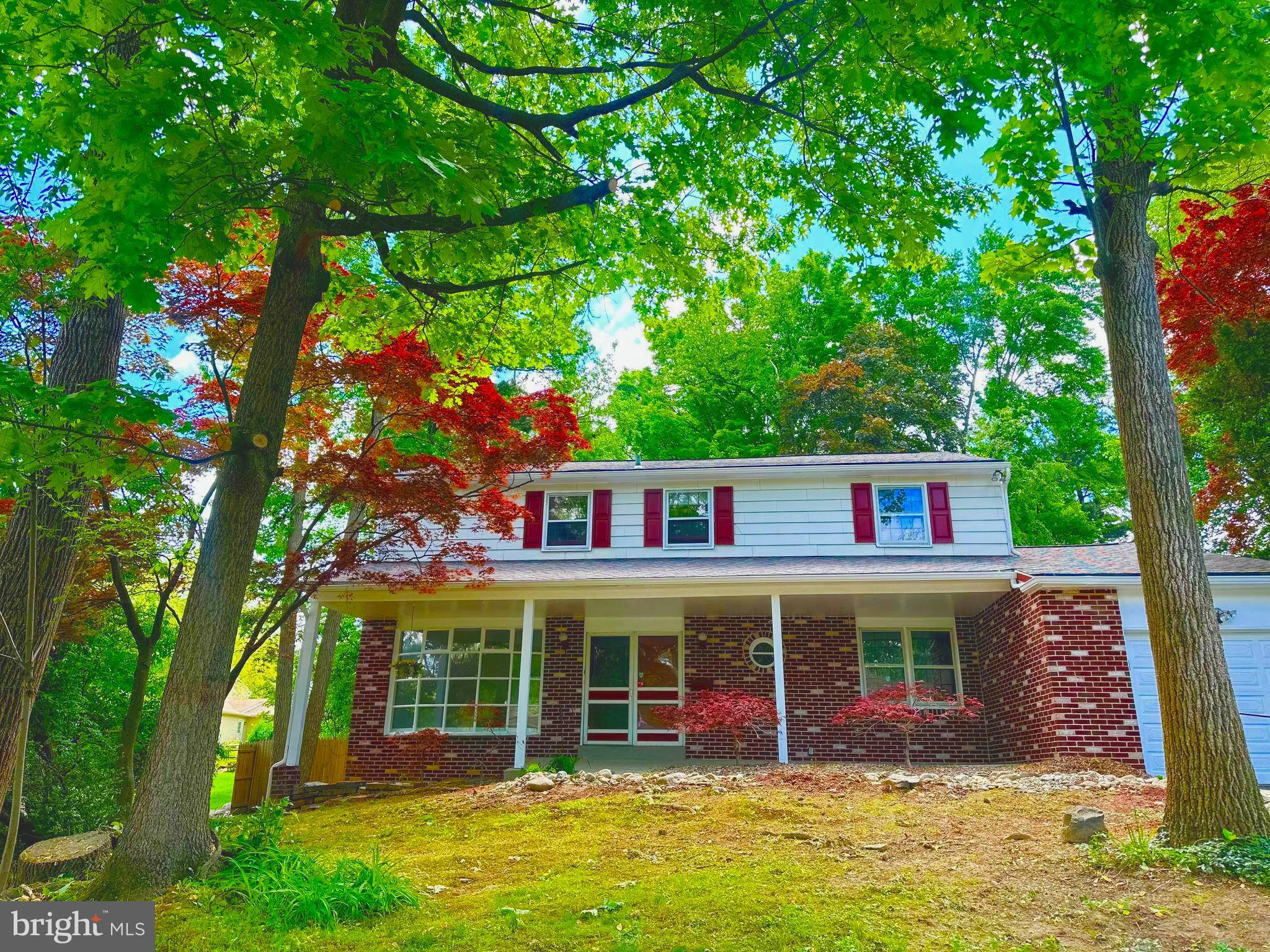 front view of a house with a swimming pool