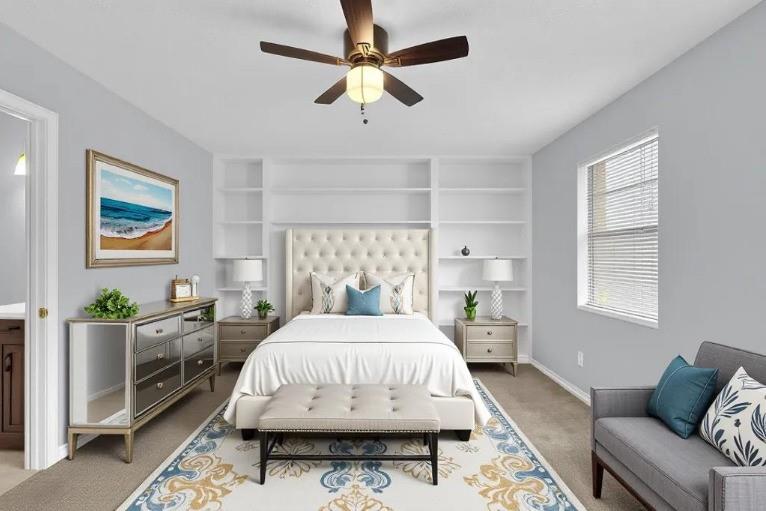 1424 Springleaf Circle Southeast Smyrna, GA 30080 - Photo 24 of 38 a spacious bedroom with a bed a couch and paintings on the wall