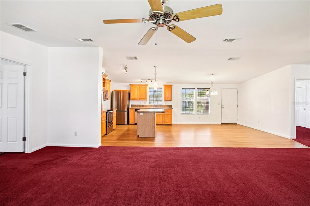 12373 Tree Street Largo, FL 33773 - Photo 15 of 43 a view of empty room with ceiling fan