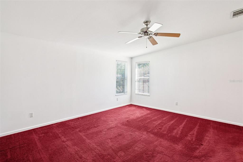 12373 Tree Street Largo, FL 33773 - Photo 26 of 43 a view of an empty room with a window