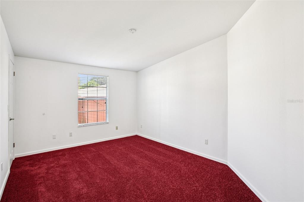 12373 Tree Street Largo, FL 33773 - Photo 29 of 43 an empty room with a window