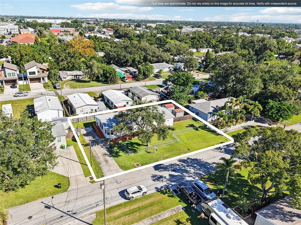 12373 Tree Street Largo, FL 33773 - Photo 3 of 43 an aerial view of residential houses with outdoor space