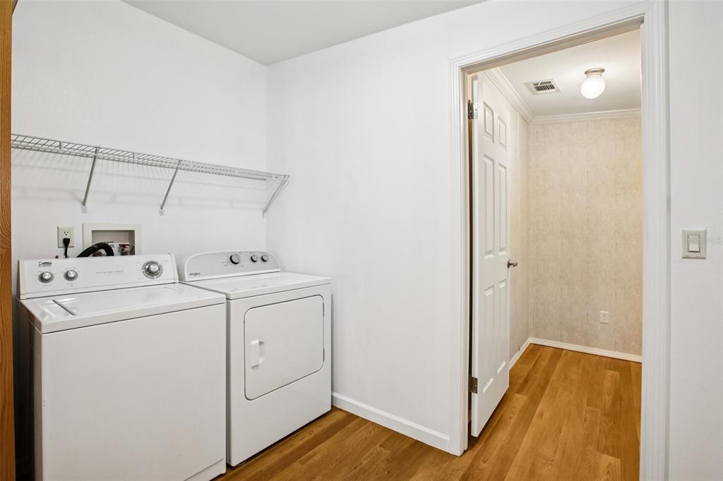 12373 Tree Street Largo, FL 33773 - Photo 32 of 43 a utility room with dryer and washer